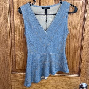 BCBG MAXAZRIA AVALON BLOUSE WITH UNEVEN BOTTOM